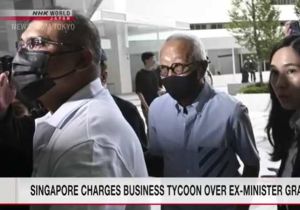 Singapore charges business tycoon over ex-minister graft case